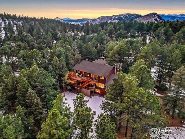 aerial view at dusk with a mountain view