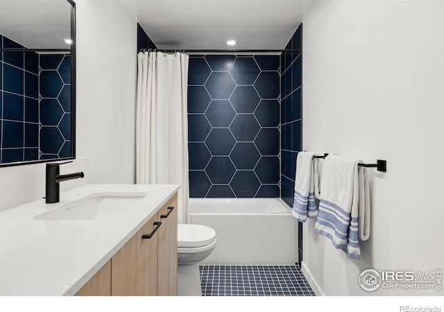 full bathroom featuring tile patterned flooring, vanity, shower / bath combination with curtain, and toilet