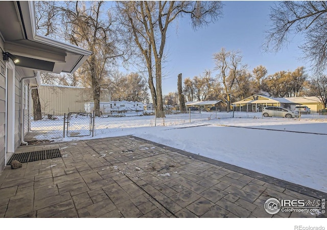 view of snow covered patio