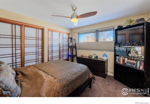 carpeted bedroom with ceiling fan