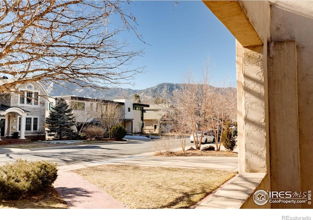 exterior space with a mountain view