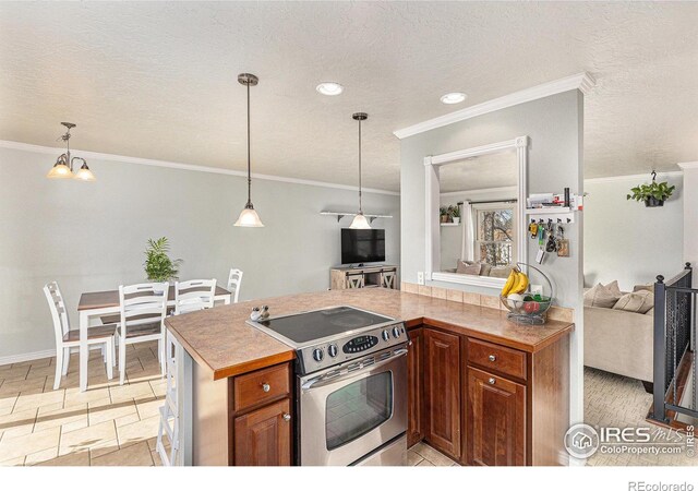 kitchen featuring pendant lighting, stainless steel electric stove, light tile patterned floors, and crown molding