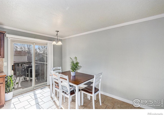 dining area with ornamental molding, light tile patterned floors, a notable chandelier, and a textured ceiling