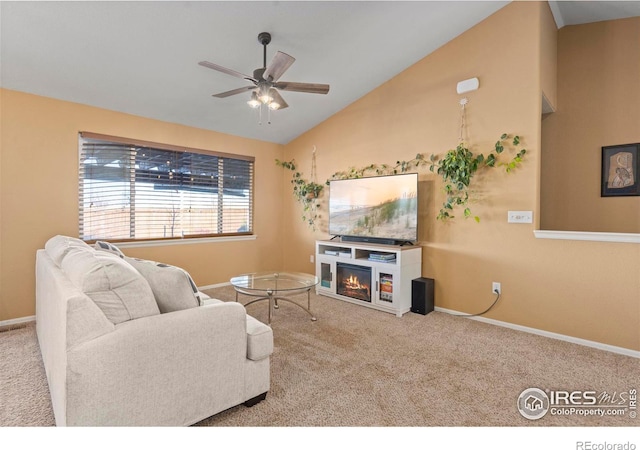 living room featuring lofted ceiling, light carpet, and ceiling fan