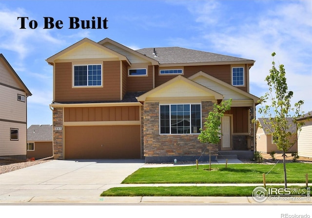 craftsman-style home featuring a garage and a front lawn