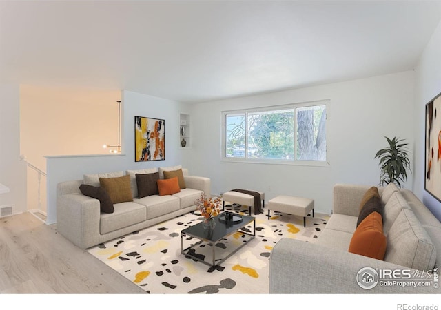 living room featuring light wood-style floors