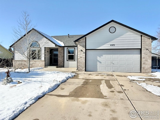 single story home with a garage