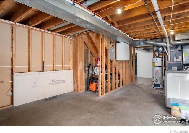 basement with washer / dryer and water heater