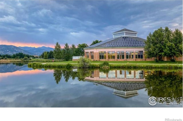 property view of water featuring a mountain view