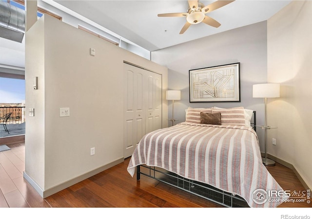 bedroom featuring a closet, ceiling fan, baseboards, and wood finished floors