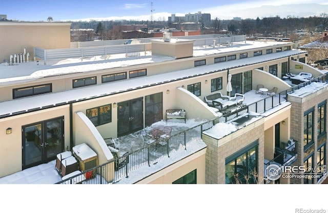 view of snow covered property