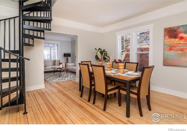 dining room with light wood-type flooring