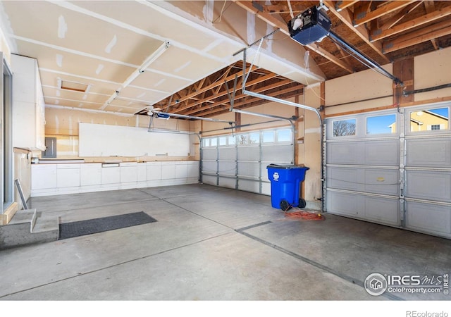 garage featuring a garage door opener