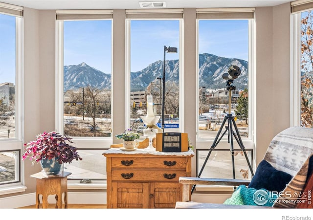 sitting room featuring a mountain view