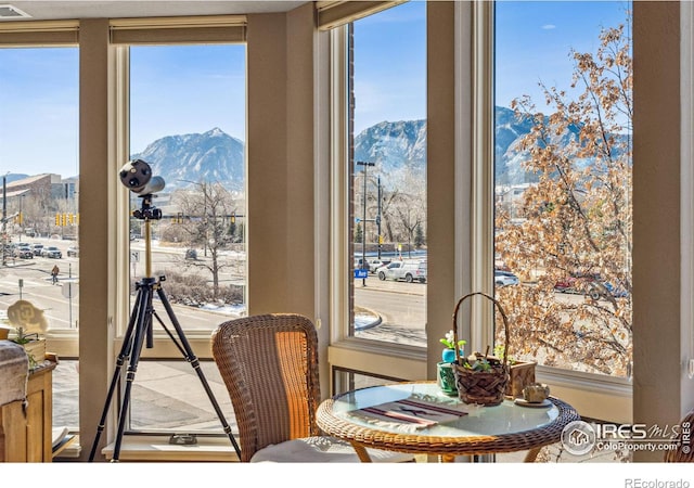 dining area featuring a mountain view