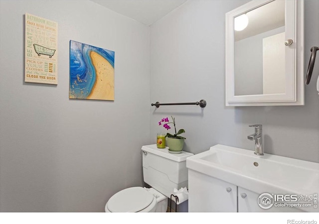 bathroom with sink and toilet