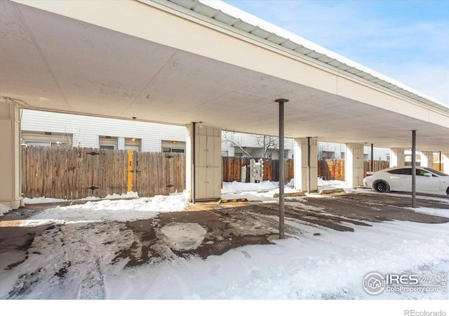 exterior space with a carport