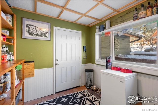 washroom featuring a wainscoted wall