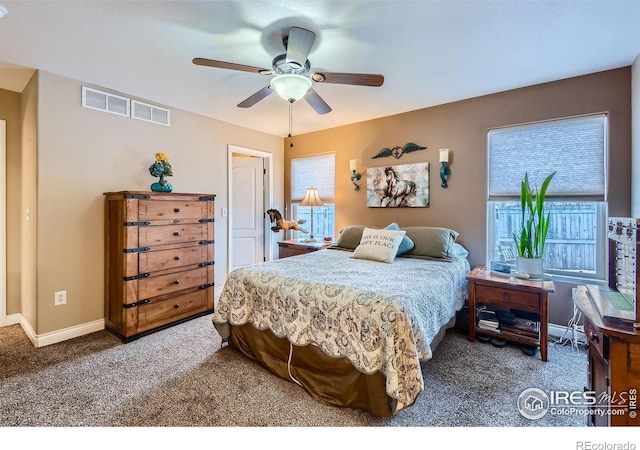 carpeted bedroom with ceiling fan