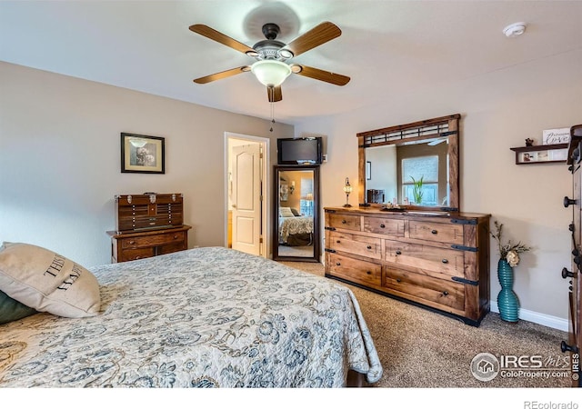 carpeted bedroom with ceiling fan