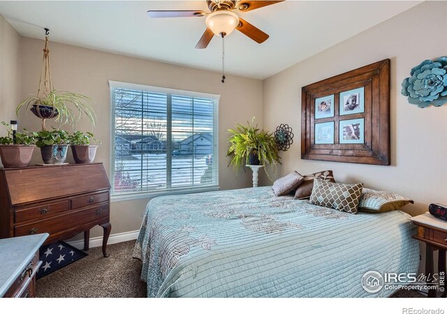 bedroom featuring ceiling fan and carpet flooring