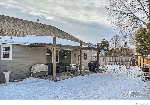 view of snow covered deck