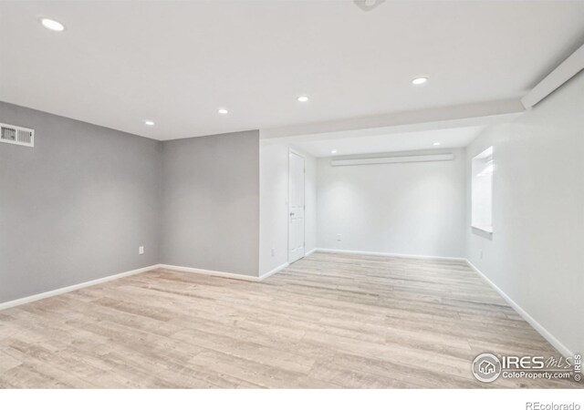 basement with light wood-type flooring