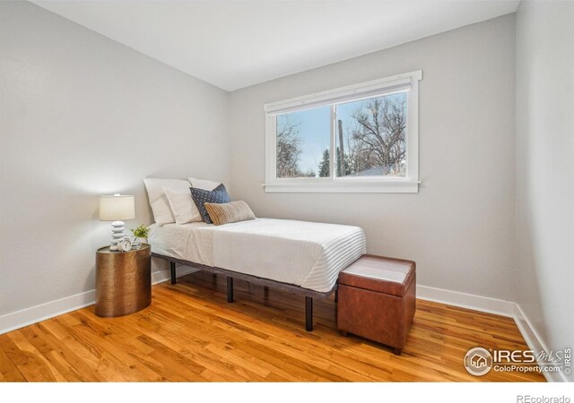 bedroom featuring light wood-type flooring