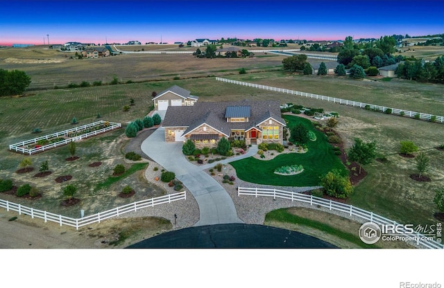 aerial view at dusk with a rural view