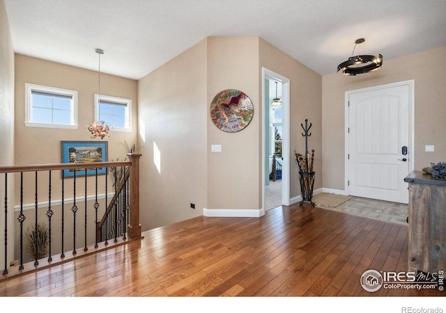 entrance foyer with hardwood / wood-style floors