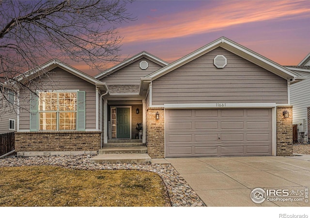 view of front of house with a garage