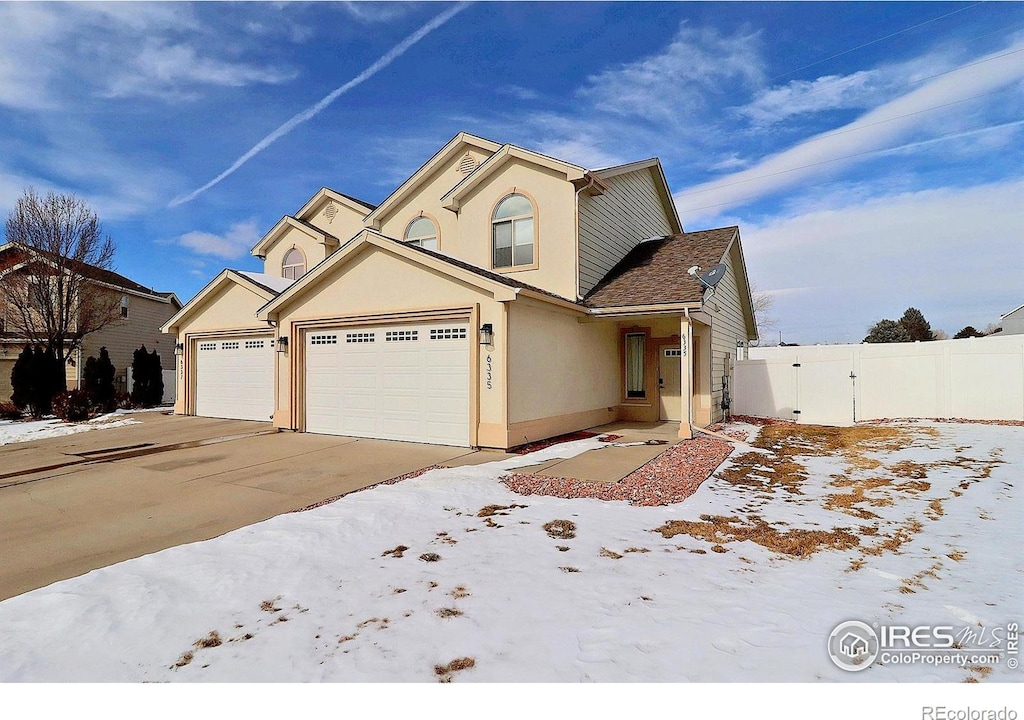 view of property featuring a garage