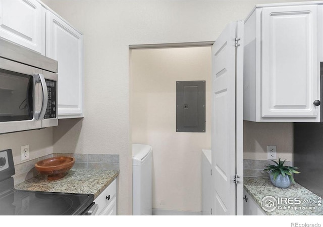 laundry area featuring electric panel