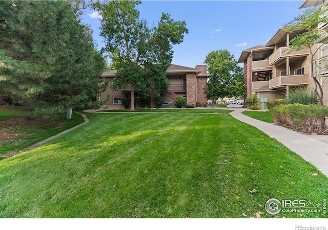 exterior space featuring a front yard