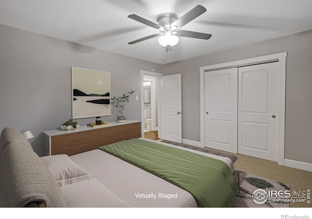 bedroom featuring ceiling fan and a closet