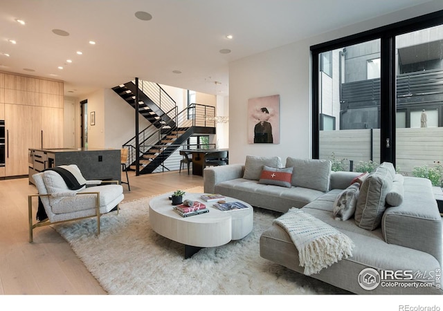 living room with light hardwood / wood-style floors