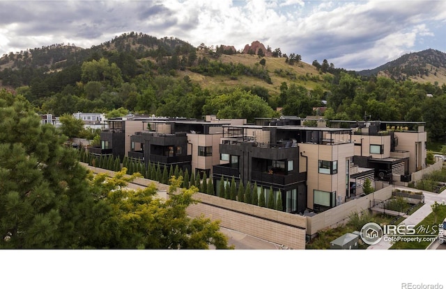 exterior space featuring a mountain view