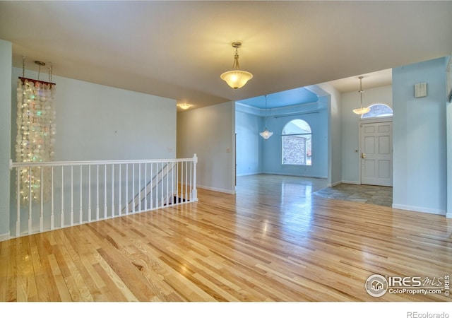 empty room featuring hardwood / wood-style floors