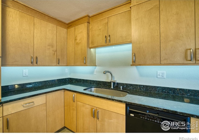 kitchen featuring dark stone counters, black dishwasher, sink, and a textured ceiling