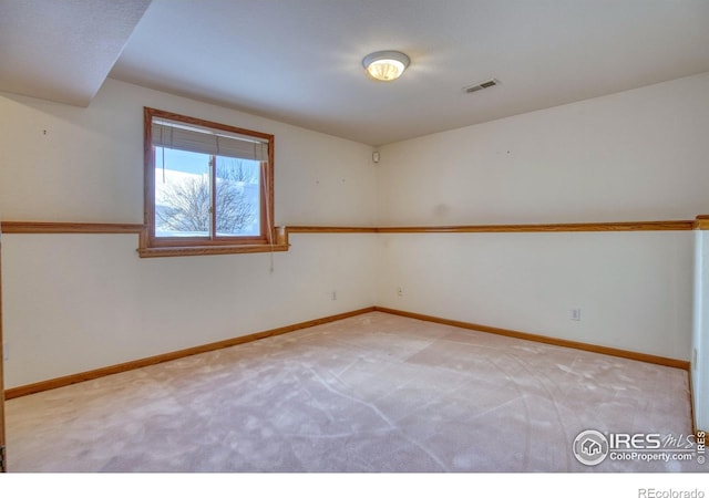 view of carpeted spare room