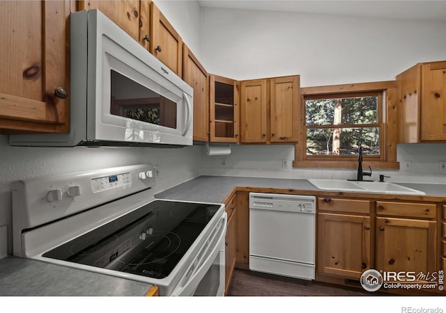 kitchen with sink and white appliances