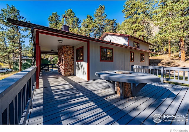 deck with a fire pit