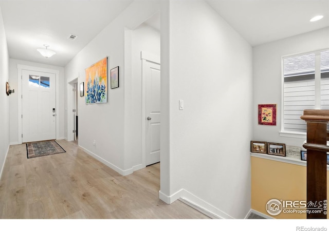 foyer featuring light wood-type flooring