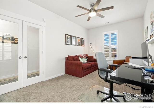 office area with light carpet, french doors, and ceiling fan