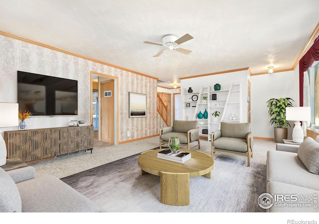 carpeted living room featuring crown molding and ceiling fan