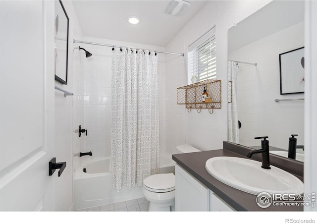 full bathroom with vanity, tile patterned flooring, shower / bath combination with curtain, and toilet