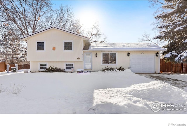 split level home with a garage