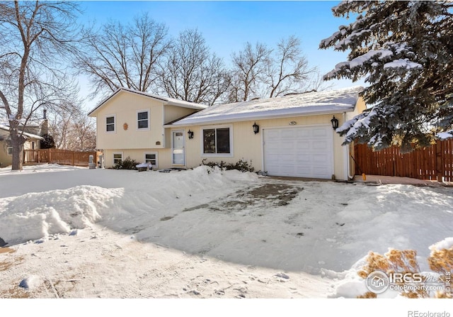 tri-level home featuring a garage