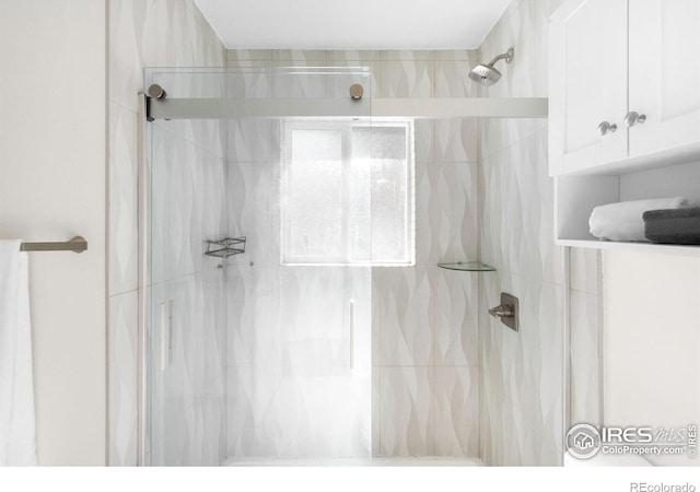 bathroom featuring walk in shower