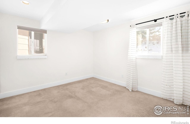 unfurnished room with carpet